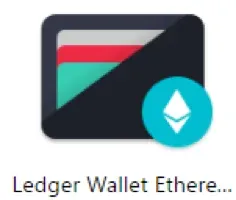 Ledger hardware wallet conectado a la PC y mostrando la pantalla principal