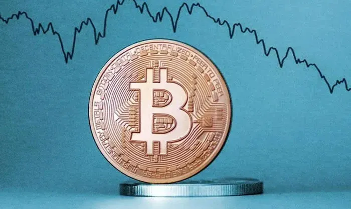 Logotipo do Bitcoin e ilustração da interface de negociação em celular