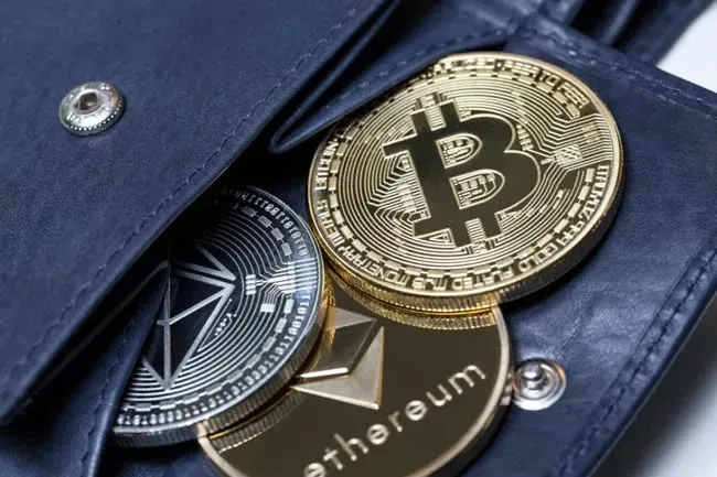 Hardware wallet and private‑key icons next to a shield