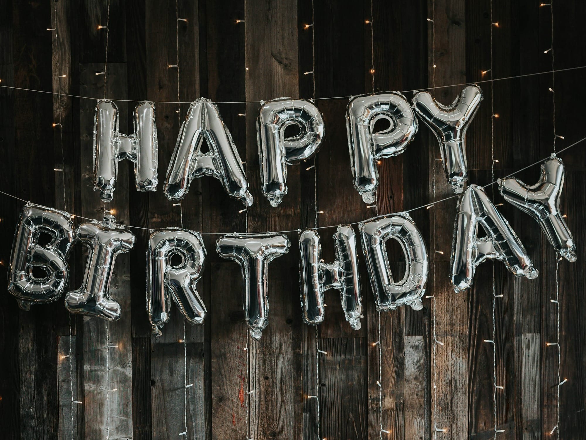 black and white wooden wall with white and black ceramic bowl