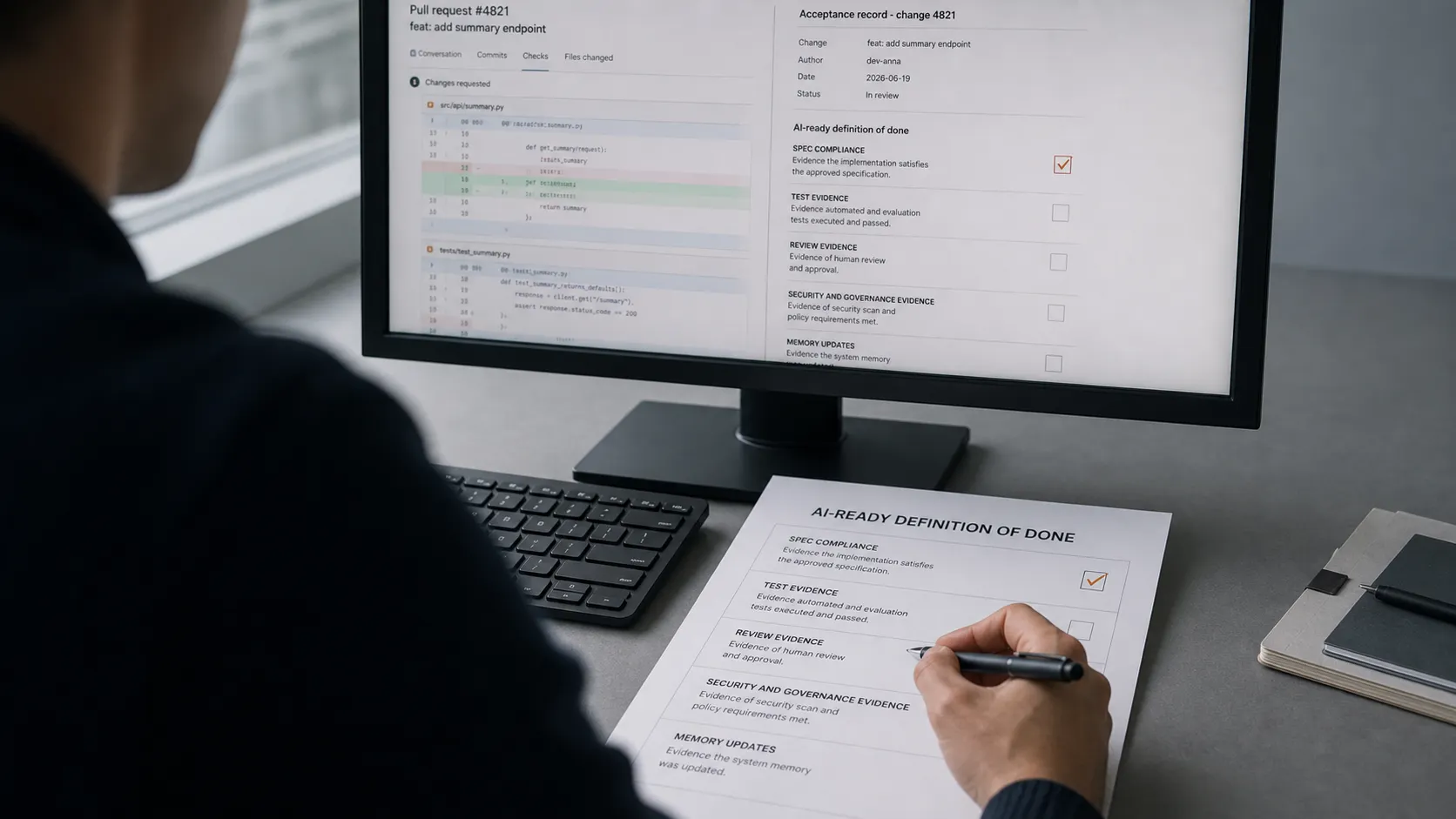 Over-the-shoulder view of a delivery lead at a monitor showing a pull request and acceptance record, walking the printed five-clause Definition of Done on the desk clause by clause, pen mid-annotation