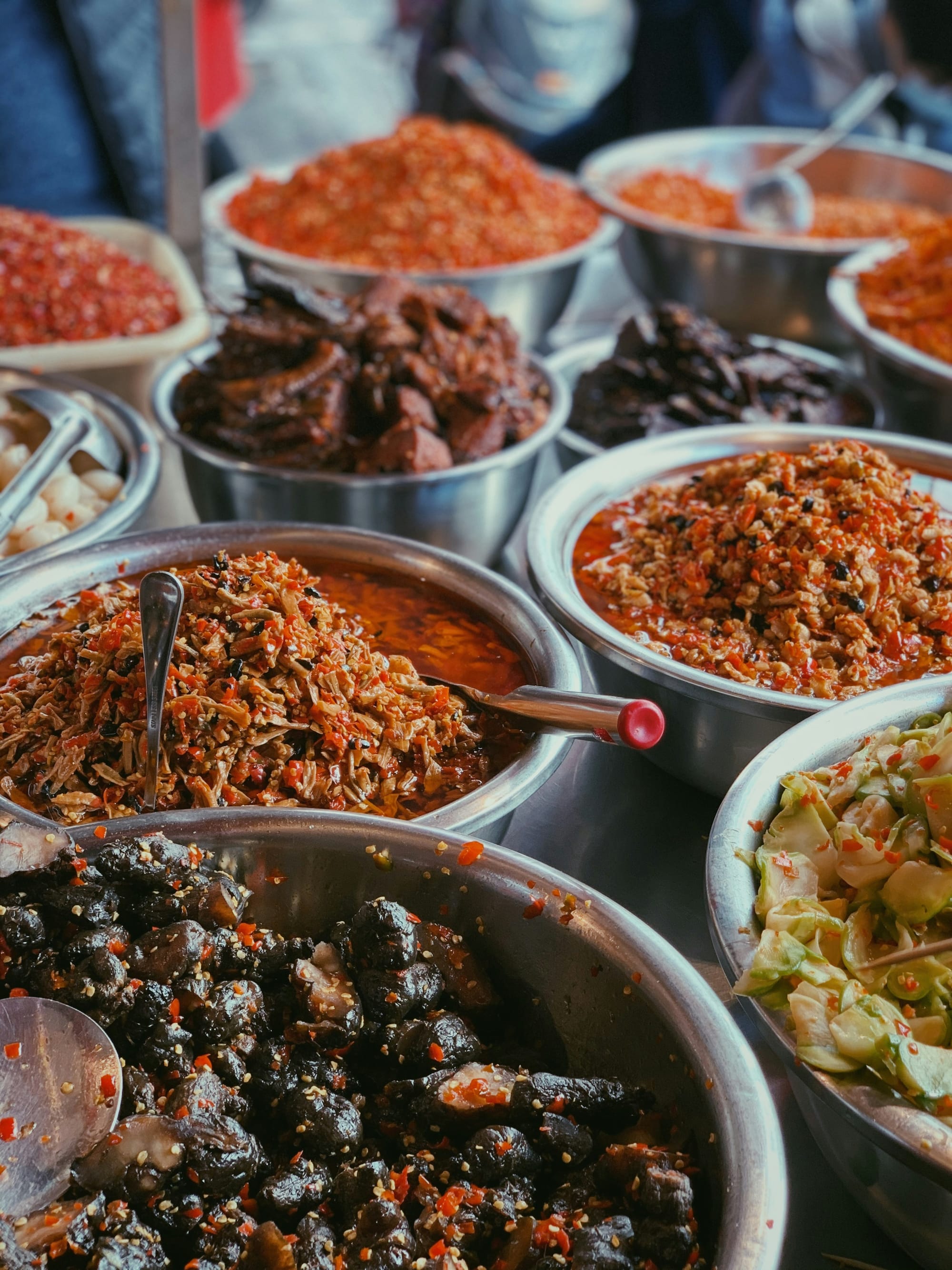 An array of pickled and preserved vegetables, which serve as the star ingredients in many traditional Hunan dishes and define classic Hunan cuisine.