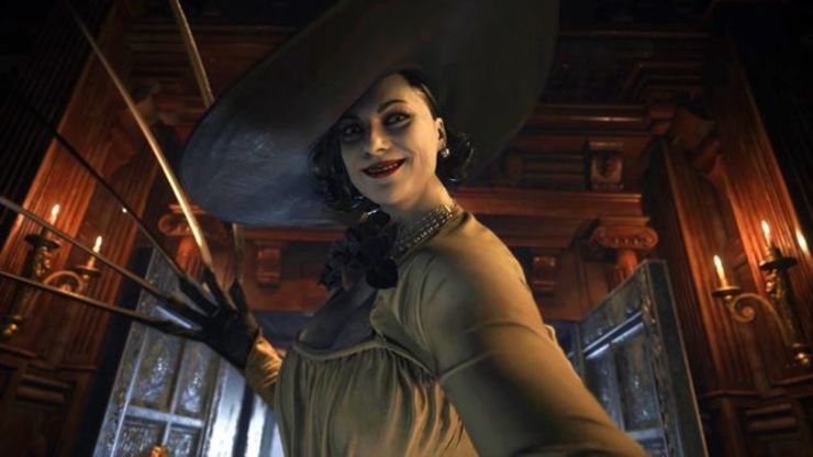 Screenshot of Resident Evil: Village. Lady D holds up her wolverine claws menacingly.