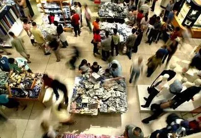 Shoppers in busy store during a group buying promotion event