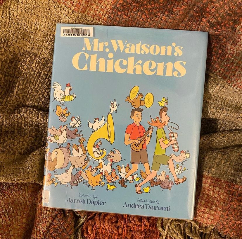 This book lies on a red and brown rug.