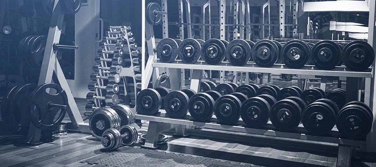 Photo of an Empty Fitness Center, How do fitness centers or gyms sell commercial exercise equipment after closing? Where can resellers source bulk lots of used business equipment?