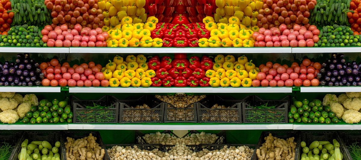 Vegetables on a shelf in a supermarket.