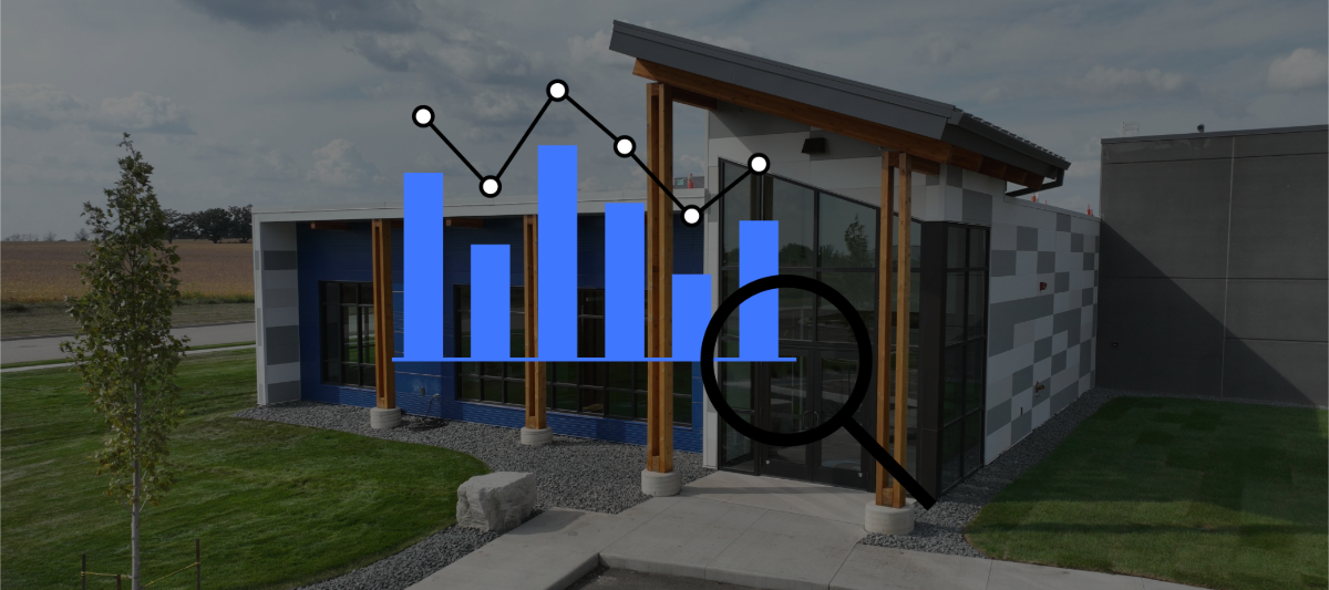 Photo of Grafe Auction's office with data analysis icon overlay.