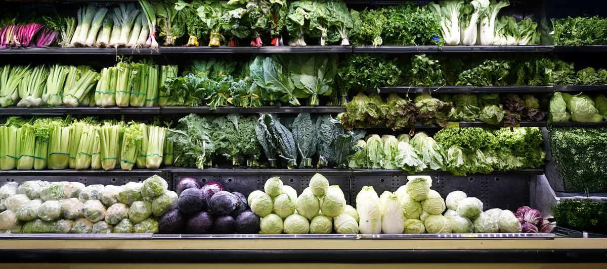 Green vegetables on a shelf in grocery store