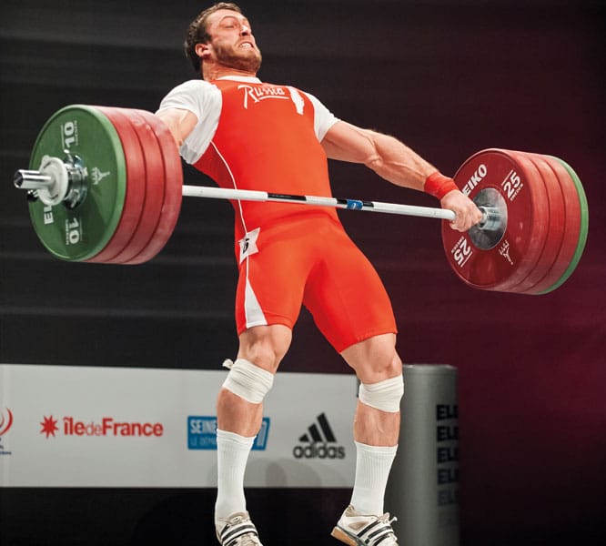 Olympic weightlifter Dimitriy Klokov demonstrating triple extension in a snatch