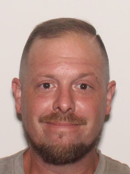 Allen County warrant photograph for Clinton M Geist