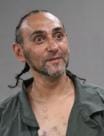 Wayne County warrant photograph for Corian Fizal Houssain