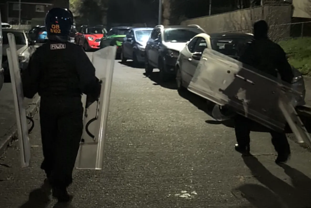 Armed police and negotiators descend on Plymouth street
