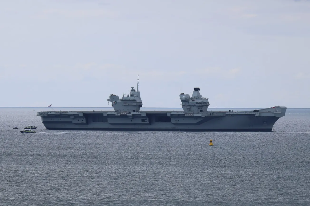 HMS Queen Elizabeth dominates Plymouth Sound under tight security