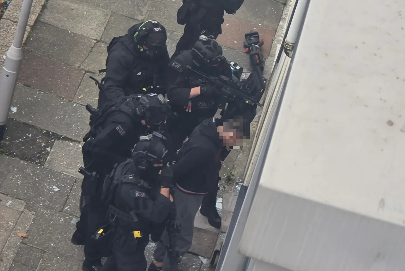 Armed police smash into Plymouth flat as three men arrested in morning raid