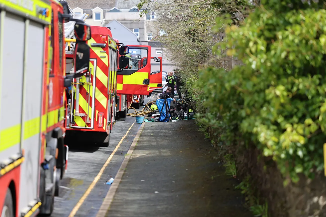 Fire crews tackle ‘smouldering’ fire involving two Plymouth properties