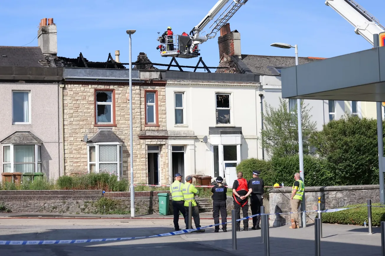 Investigation underway after house fire destroys two houses - latest updates