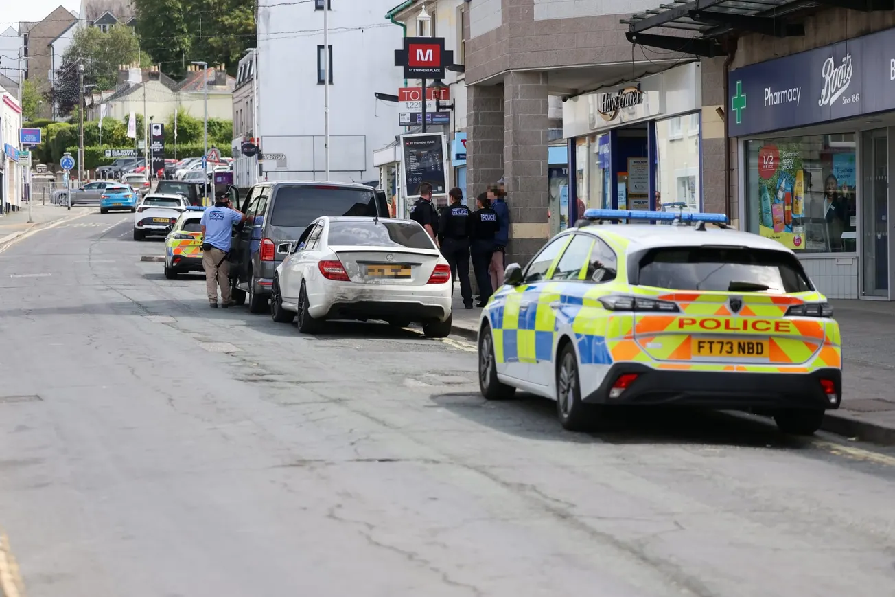 Armed police descend on busy high street