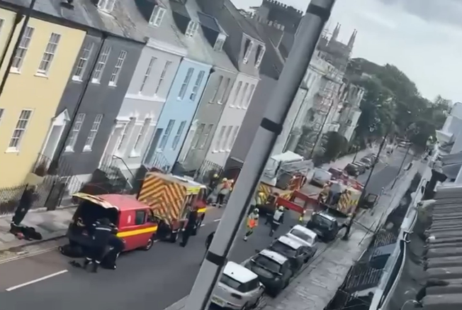 Woman in distress rescued from roof in Plymouth