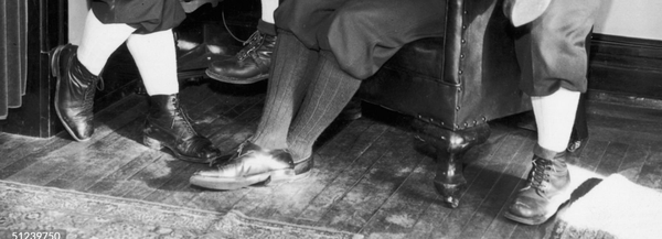 She mocks his socks