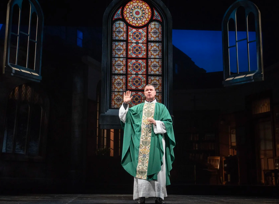 applauding an accused priest....