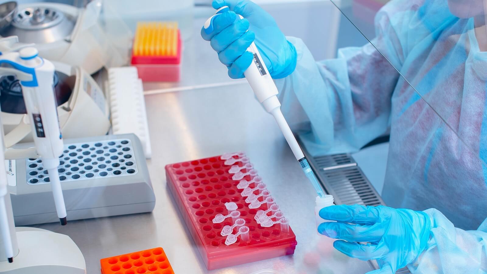 Lab worker experimenting