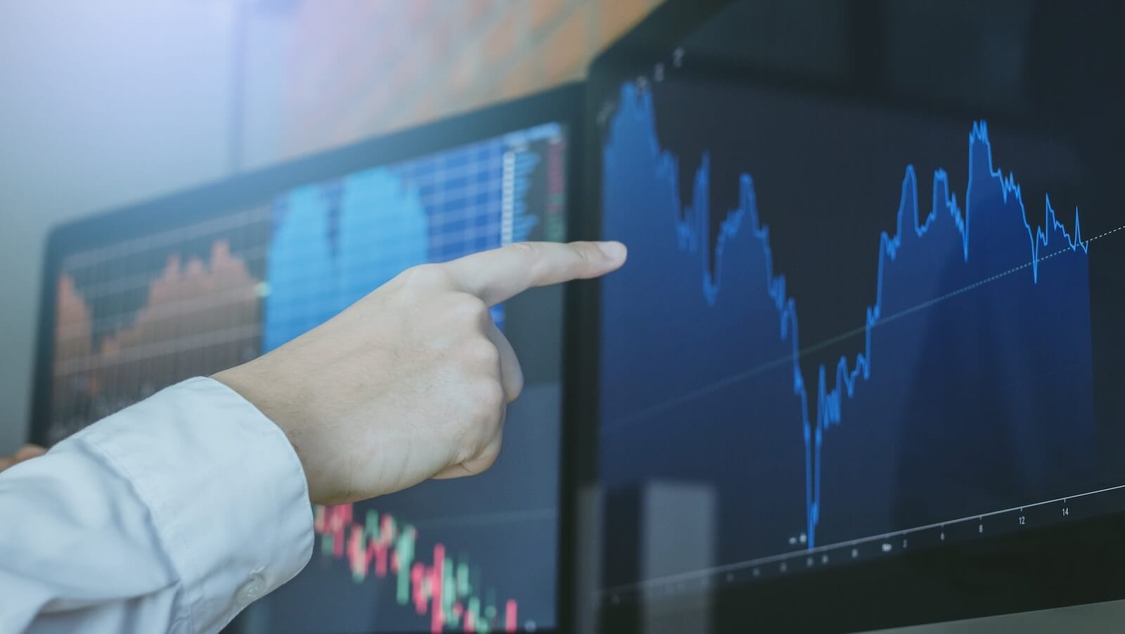 Man pointing at chart
