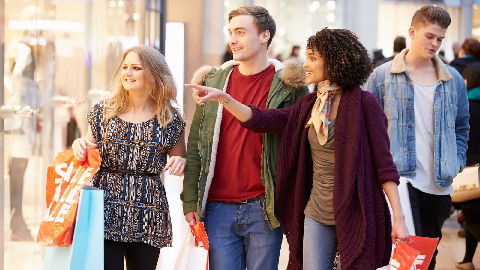 Group of people shopping in mall