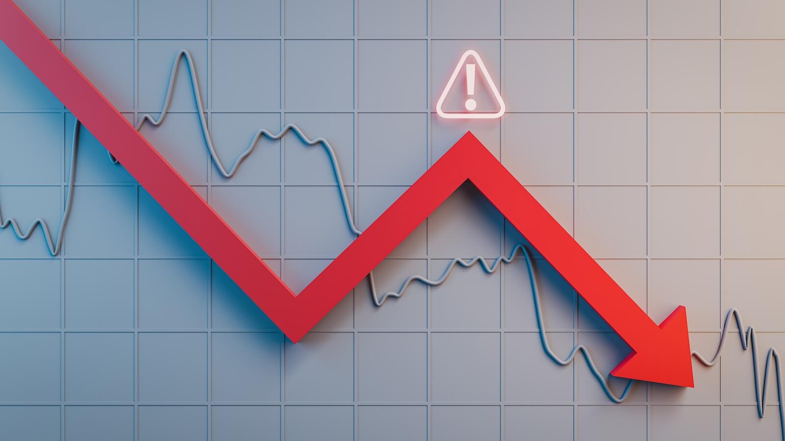 Arrow pointing lower with chart in background: warning signs at last peak