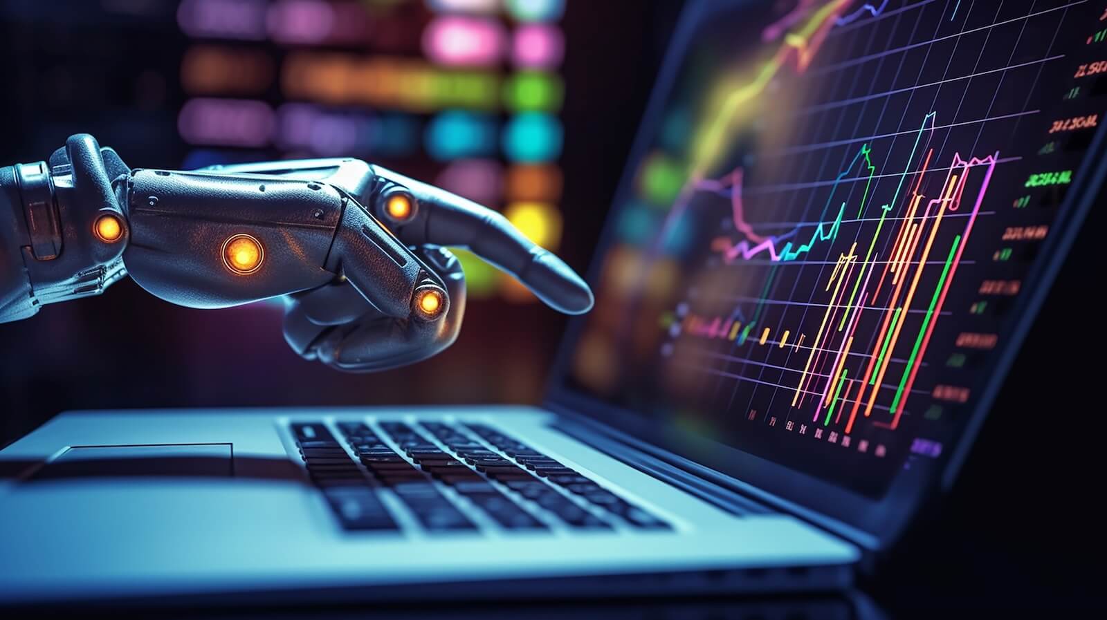 Laptop with robot hand trading stocks