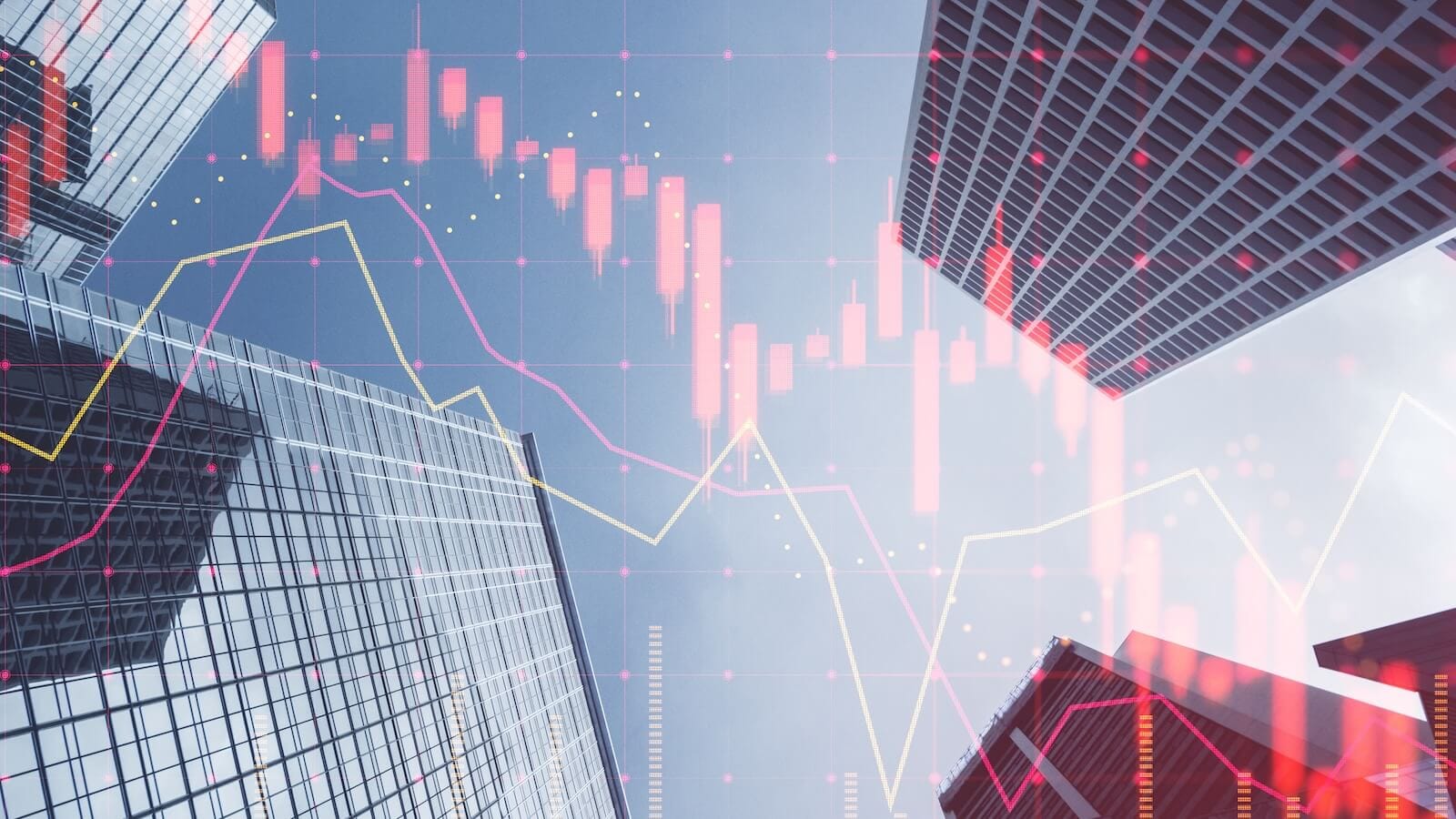 Bank buildings with charts above them: Financials sector keeps surging