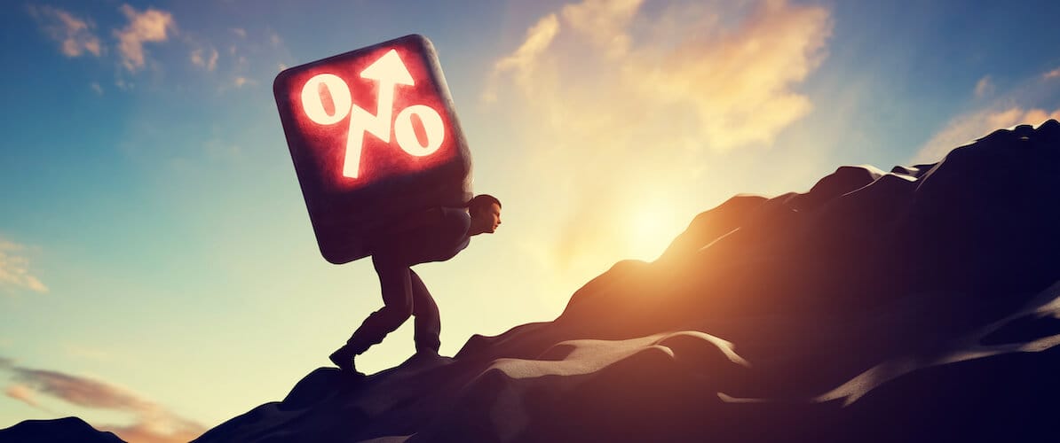 Person carrying the weight of yield on back: Finding opportunities for income investing