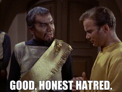 GIF from an original Star Trek episode where the Klngon, Kor, enjoys Captain Kirk's "honest hatred" towards him