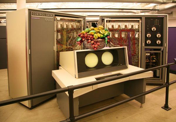 An old-timey super-computer with a fruit basket atop its monitor, a la Carmen Miranda. Original image source: https://www.flickr.com/photos/jitze1942/4345058981/in/photostream/