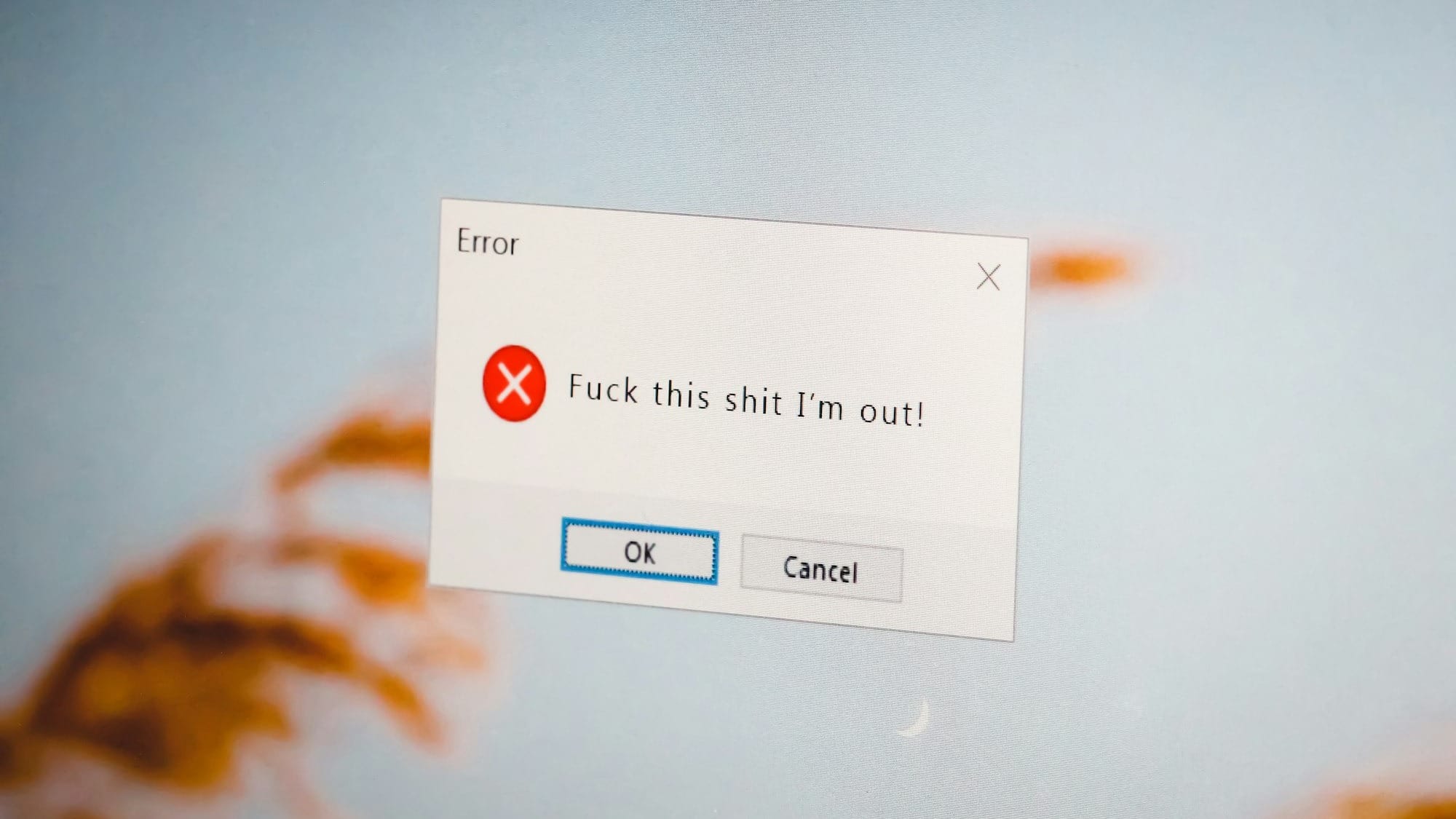 a close up of a computer screen with a sign on it