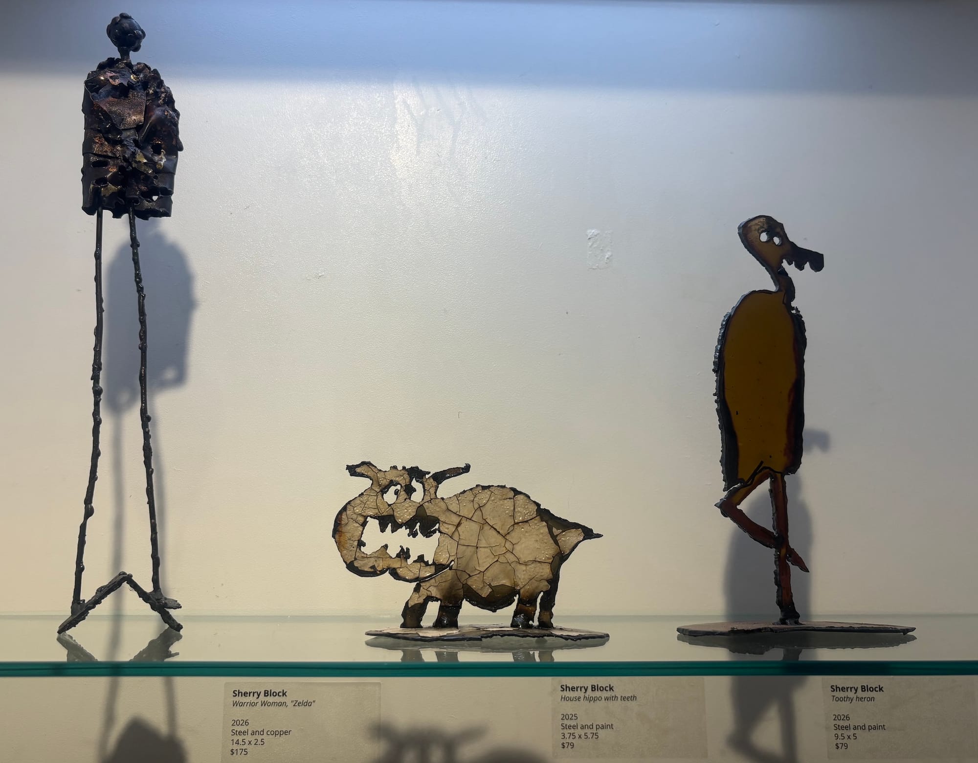 From left to right: "Warrior Woman, 'Zelda'", "House hippo with teeth", and "Toothy heron"