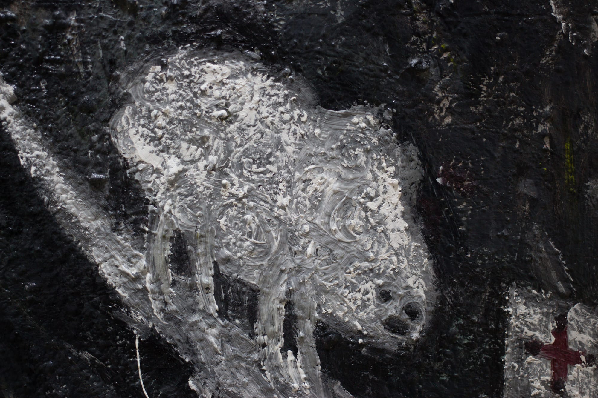 A highly textured painting of a lumpy white creature with eyes and a mouth. It has four legs. It's headed down a slope toward a sign with a red cross.