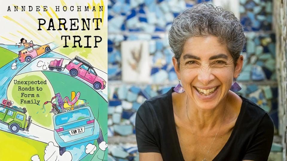 Cover of "Parent Trip" side by side with a photo of author Andee Hochman, smiling a big smile with short gray hair. The book cover is a colorful, whimsical illustration of cars on a winding r