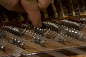 The Kanun Squeezes In Between C And C sharp