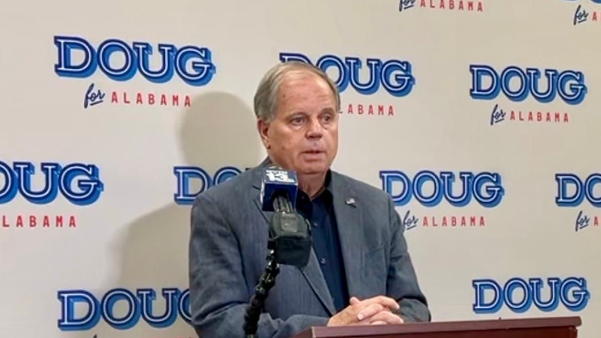 Jones hits Tuberville, Flock and AI in Birmingham