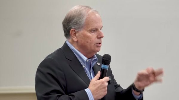 Doug Jones: “Don’t Take a Knee, Coach.”