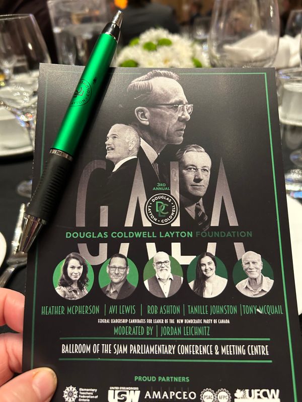 A black pamphlet with white and green lettering, with black and white photos of the 5 current NDP leadership candidates.  Above them are pictures of Tommy Douglas, MJ Coldwell, and Jack Layt