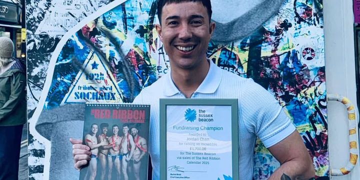 Jordan Chan raises £3,400 for Sussex Beacon and Terrence Higgins Trust with Red Ribbon Calendar
