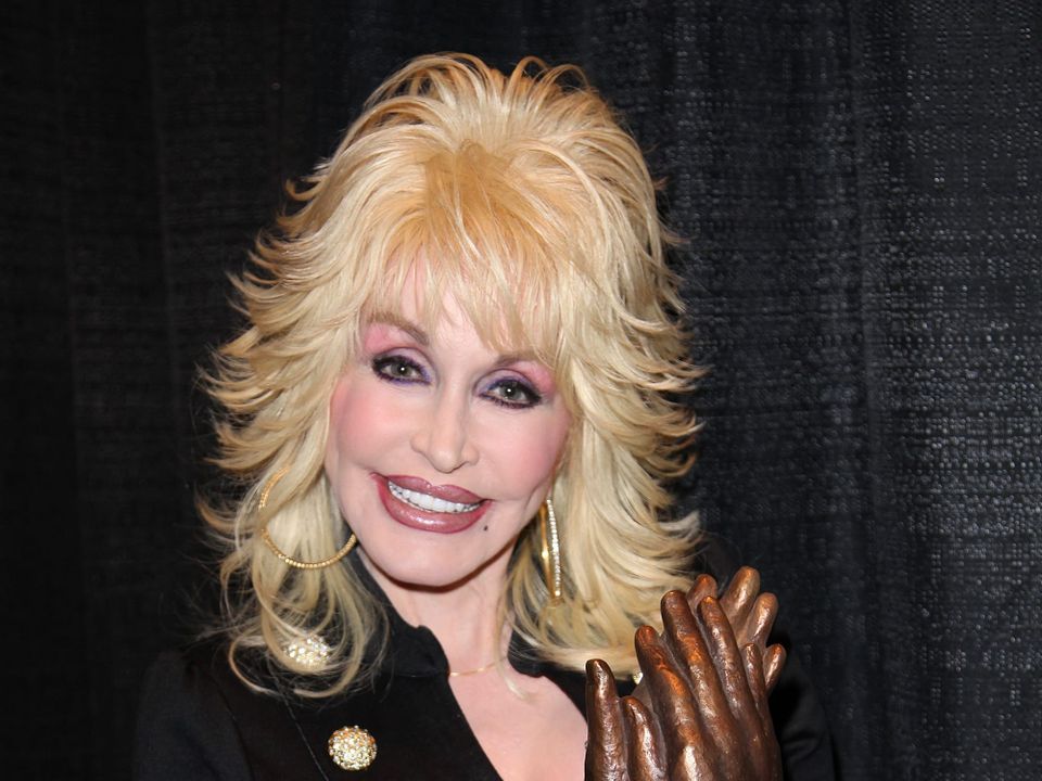 Dolly Parton assures fans she's "doing fine"