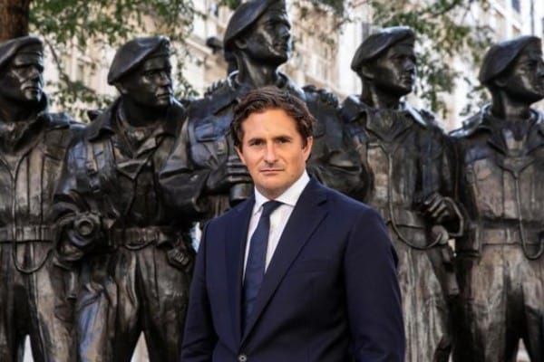 Defence minister apologises for Catholic priests who outed LGBT soldiers