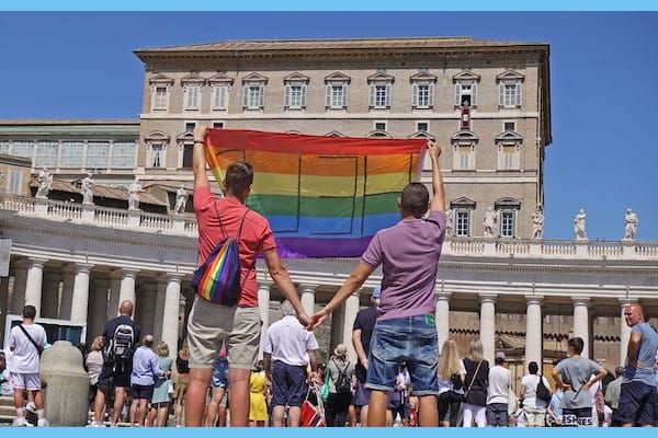 Polish gay couple Jakub and David unfold Rainbow Flag at the Vatican
