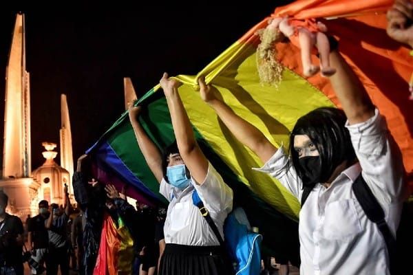 LGBTQ+ activists and anti-government protestors march in Thailand