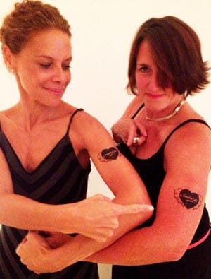 Billie Myers and Sue Baker, sport their "Time to talk' tattoos