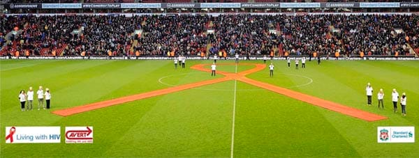 AVERT, Standard Chartered Bank & Liverpool FC unveiling world’s largest red ribbon, World AIDS Day 2012.