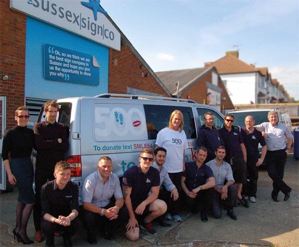 Sussex Sign Company staff team with Christina